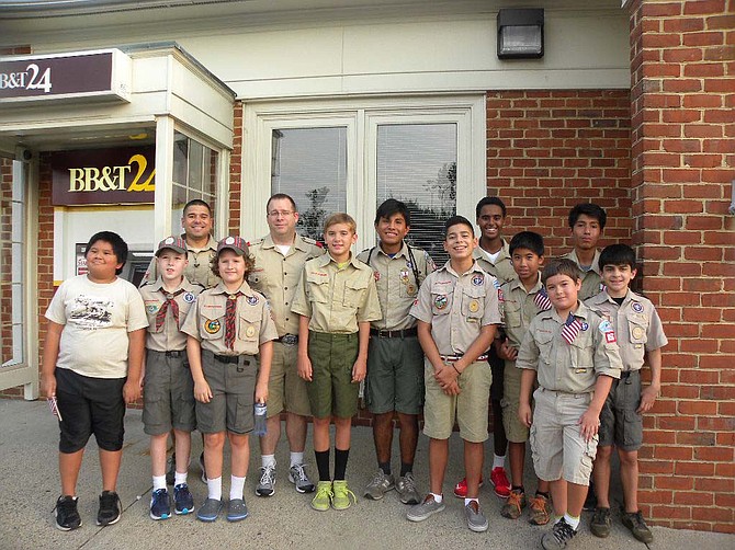 Springfield boy scouts Pack 868 and Troop 856 march in the 14th Annual BridgeWalk in Springfield.