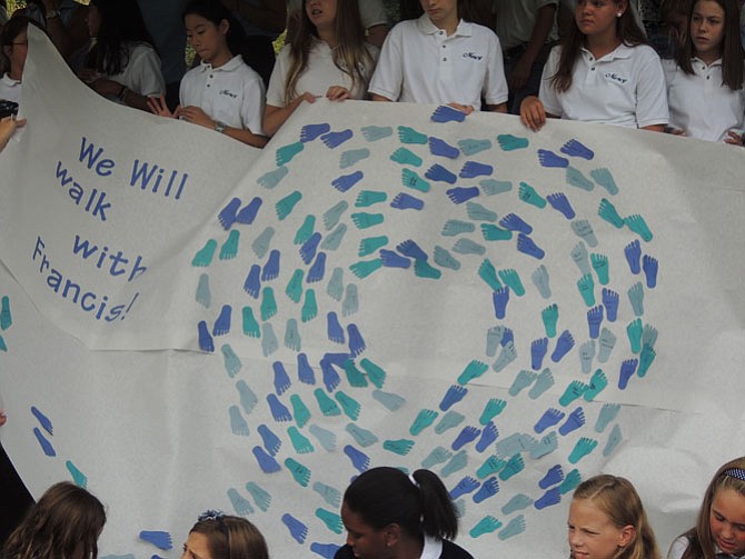 The footprint banner was signed by all of the students.
