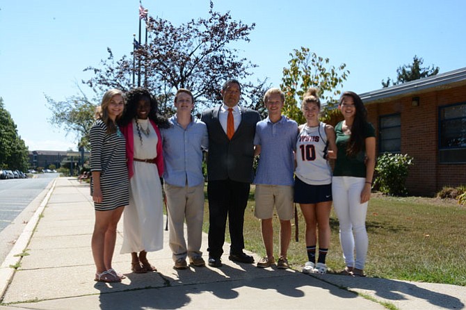 West Springfield student leadership and principal Michael Mukai enjoy some sunshine during lunch on the first day of school. (From left) Brittany Branch, Grace Duah, Caleb Plott, principal Mukai, Collin Farquhar, Abby Basse and Michelle Park.