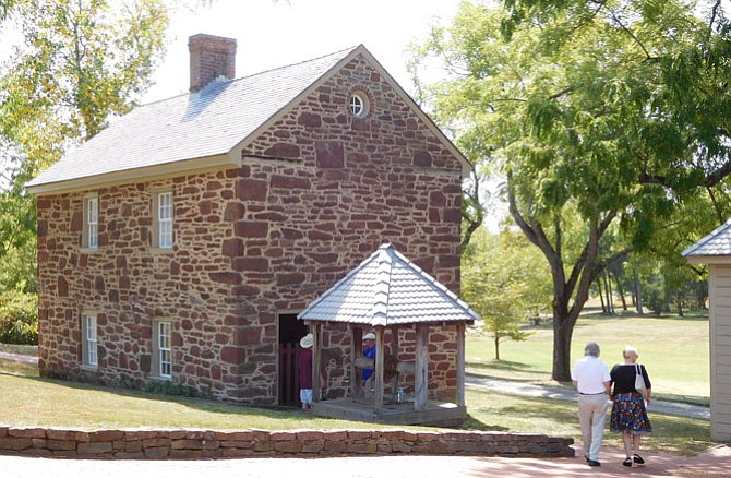 Visitors head toward the story dairy to peek inside.