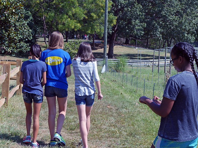  It is a Friday afternoon and the sixth grade watermelon social has just ended. Eighth grade world geography classes are learning all of the things that should be on a map. Tom Weber, 25-year world geography teacher at TJ has just asked his class section what is T (title); what is L (legend). “Walk from the cone and count the steps. Use symbols in your legend and mark down landmarks such as that trash can, a really, really big tree, or this trail — the more detail the better.” In a couple of weeks they will move on to their first big global project, the world of water.
