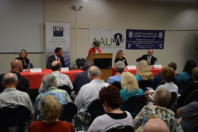 From left: Candidates for Mount Vernon District supervisor Jane Gandee (R), Dan Storck (D) and for Fairfax County School Board Mount Vernon representative Karen Corbett Sanders and W. Anthony Stacy participated in a question-answer session hosted by the League of Women Voters. 
