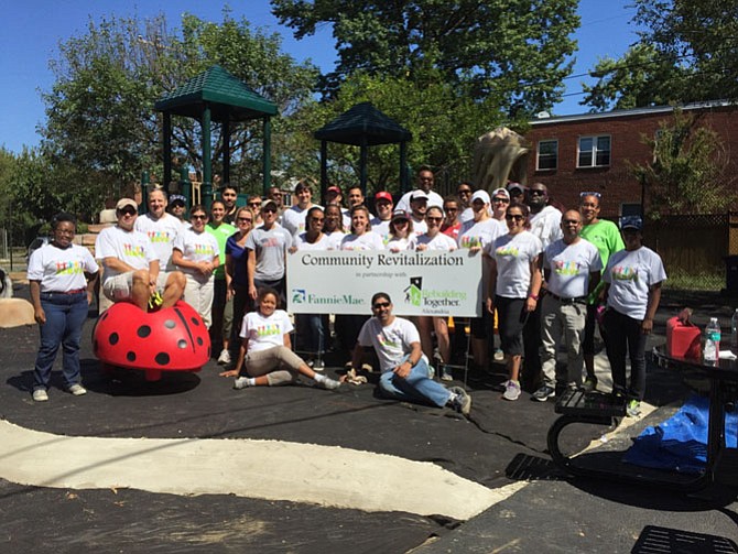 Rebuilding Together Alexandria volunteers from Fannie Mae working in Hume Springs Park.
