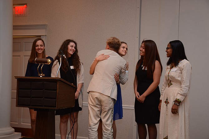 (From left) J.E.B. Stuart High School seniors Anna Rowan, Cassie Marcotty, Marley Finley, Abby Conde and Lidia Amanuel accept the Fairfax County NAACP president’s award recognizing their Students for Change petition to change the name of their school to Thurgood Marshall. 