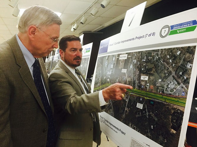 Engineer Nick Roper and Supervisor John Foust discuss initial design plans for a $265 million project to widen 6.9 miles of Route 7 from Reston to Tysons. The Virginia Department of Transportation held a public information meeting at Forestville Elementary School on Sept. 24.