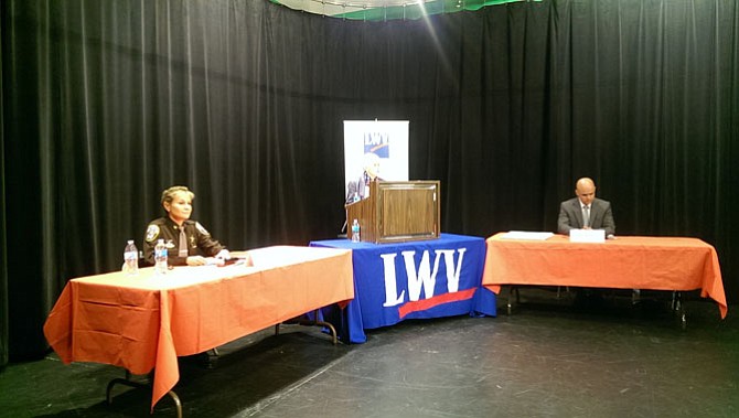 Fairfax County Sheriff Stacey Kincaid (left) answers questions opposite opponent Bryan Wolfe (right) in a quasi-debate moderated by the Fairfax League of Women Voters co-president Helen Kelly (center).