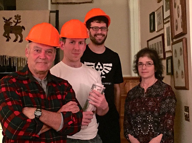 Patrick David, Kevin Comer and Michael Schwartz stand with the director, Laura Fargotstein, after an evening of rehearsal. 