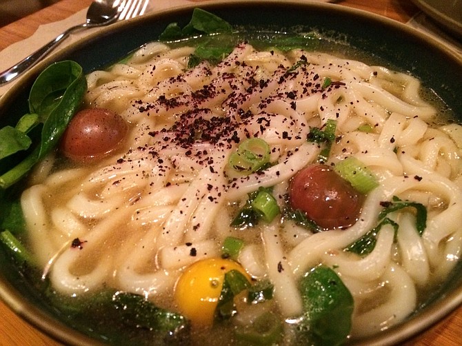 A rainbow of vegetables are there for the eating in the udon noodle soup, which also features a piping-hot ginger broth.
