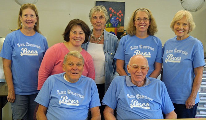 Lee Center Spelling Bee contestants dressed in their blue Lee Center Bees T-shirts include: (from left front) James Shea (winner of the sudden death spell-off), Thomas Kerwin (second sudden death contender); Carol Mackela, Adrianna Carr (director of the Lee Senior Center), Mary Wingo, Catherine Jamieson (contestant pulled from the group at the last minute to serve as judge), and Ruth Ann Neely.  
