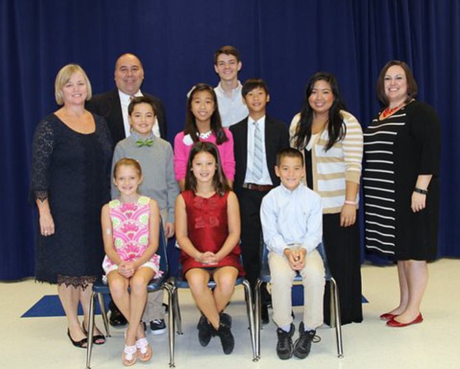Churchill Road's newly elected SCA officers are (front row seated, from left):  Jordan Rupli, Sergeant-at-Arms; Kayla Moore, Vice President; Matthew Kim, Treasurer; and (back row standing, from left) Alex Alvarez, Historian, Jackie Liu, Secretary; and Billy Oh, President.  Also pictured standing from left:  Jennifer Niccolls, Assistant Principal; Donald Hutzel, Principal; Kevin Pulley, Langley HS Senior Class Vice-President; Mikaela Antonio and Shana Schnaue, SCA sponsors.