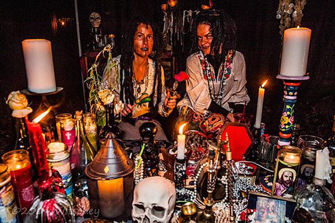Sara Holbrook of Clifton (left) and a friend Holly Jones (right) prepared a voodoo scene for the 2014 Haunted Trail in Clifton.
