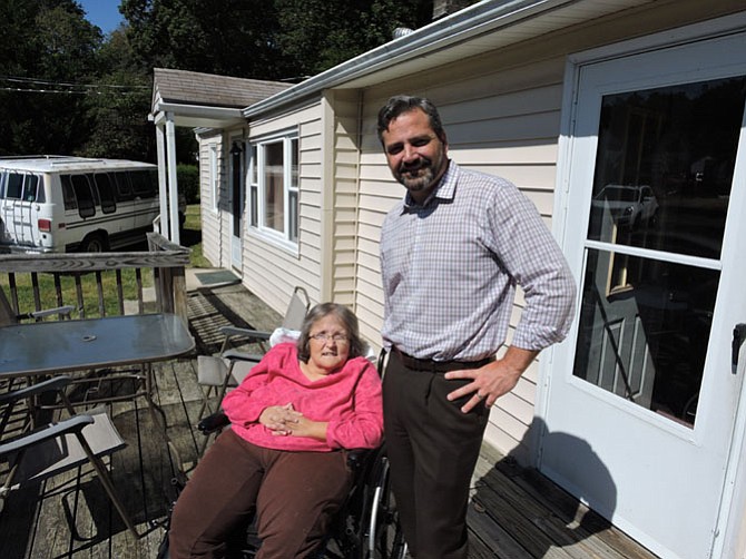 Home remodeler Bob Gallagher, who grew up near Clifton, has organized a benefit to help Dixie Dawson with repairs to her house including a deck, and wheelchair ramp. Dawson, who has Spina Bifida, has lived most of her life in the rambler off Popeshead Road her father built in the early 1960s. Gallagher is a principal at Sun Design Remodeling. 