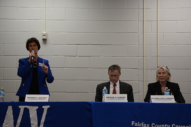 Candidates for Board of Supervisors chairman Sharon Bulova (left, incumbent), Arthur Purves (center) and Gail Parker (right) meet at James Madison High School on Oct. 13.
