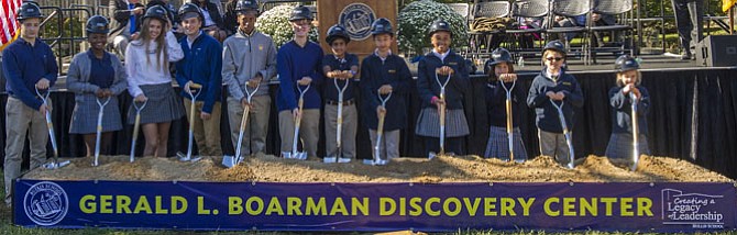 Student representatives from all Bullis classes, grades 2-12, wielded shovels at the groundbreaking ceremony for the 67,000-square-foot Gerald L. Boarman Discovery Center. Construction is expected to be completed in spring 2017. 
