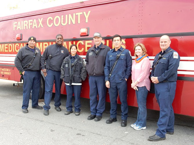 Captain Nicholas Weresnick of the West Springfield Fire Station (far right), Mary Ann Zegeer, PTSA member at West Springfield High School (second to the right) and the West Springfield Fire Station crew who participated in the SpartanFest. They prepared the Fire Truck Demos this year and students also had an opportunity to take a look inside the medical ambulance bus.
