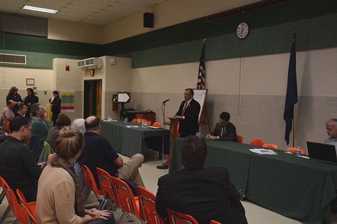 Jerry Foreman and Scott Surovell, opponents competing for the 36th District Virginia Senate seat, debate on Oct. 27 at Stratford Landing Elementary School in the Mount Vernon area of Alexandria.