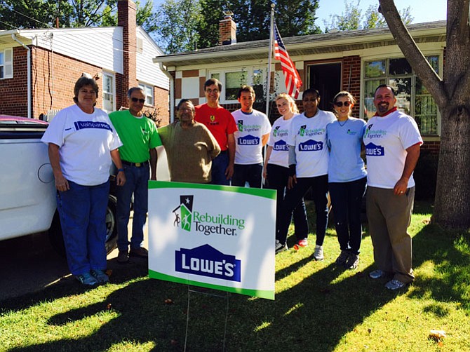Lowe’s employees worked with Rebuilding Together Alexandria to get a local home ready for winter.
