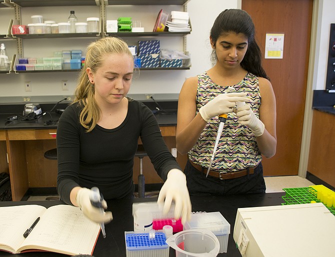 Panja Vij, right, of Great Falls, a student at the College of William and Mary, wins one of the biggest prizes in synthetic biology.