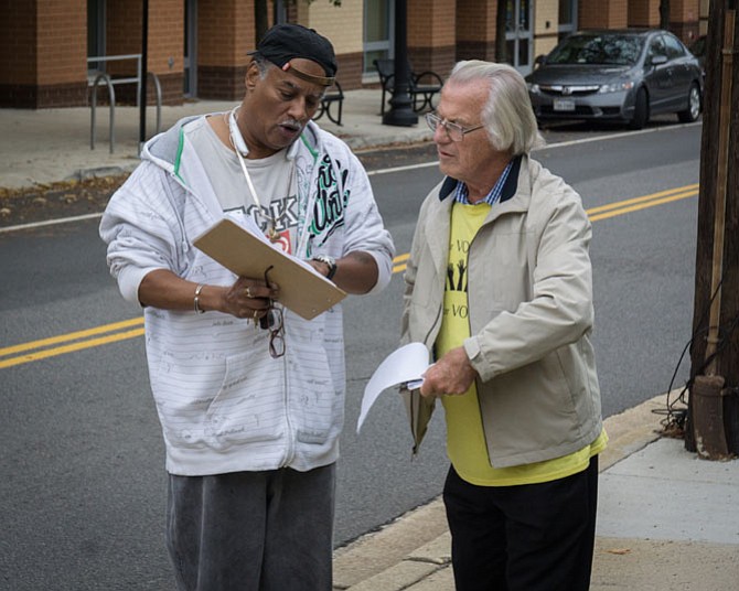 Paul Douthit of St. Mary’s Episcopal Church checks in volunteers.
