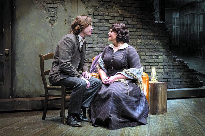 Jason Slayden as Rodolfo and Elaine Alvarez as Mimi in Virginia Opera’s “La Boheme.”
