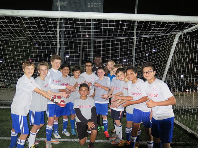 Douglas Murcia is in the center surrounded by his team. His coach Yusuf "Iche" Sindeh and Dr. Crissy Markova are in the back row.
