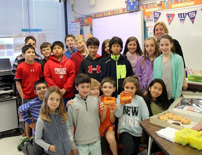 Jill Hamlin’s fifth grade class at Churchill Road Elementary raised more than $220 for UNICEF. Pictured front row from left: Carlos Rojas, Anna Grace Eckberg, Mack Koopman, Joseph Racich, Thomas Spear, Noor Golesorkhi, Angelica Carlos; back row from left: Miles Crossley, Lenny Wiese, Ian Starban, Ben Gerard, Jake Loadwick, Pierce Hokenson, Young-Min Hong, Suzanne Monteleone, Odil Khaitov, Ava Proctor, Hannah Smouse, and Campbell Collins and Ms. Hamlin.  (Not pictured:  Jordan Rupli and Min Ha Yoon).
