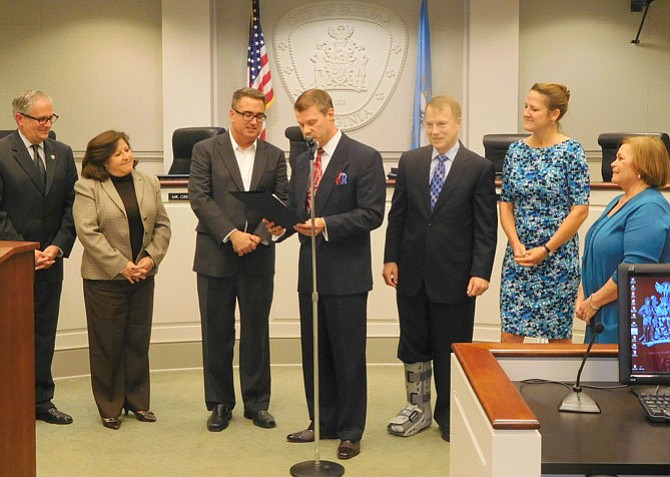 Proclaiming Nov. 17, 2015 “Scott Silverthorne Day” (from left) are Michael DeMarco, Ellie Schmidt, Scott Silverthorne, Jeff Greenfield, David Meyer, Nancy Loftus and Janice Miller.