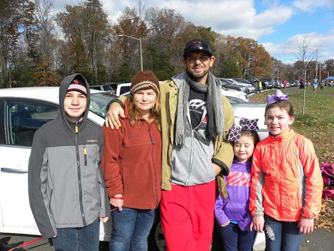 From left, family members Scott and Jean Cummings, of Virginia Beach, Bridget, 6, and Grace, 9, Smith, of Fairfax, attend the first American Kidney Classic lacrosse tournament in support of Matthew Moody, center, who was diagnosed with Goodpasture Syndrome, a rare autoimmune disease.