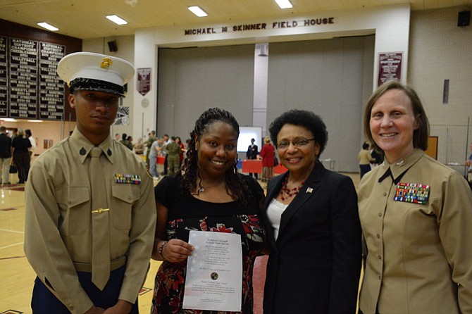 From left, Mount Vernon sophomore Victor Merriweather, Carla Moss (Mount Vernon class of 1989 and a U.S. Army veteran), interim principal Esther J. Manns and Senior Marine Instructor Col. Caroline Simkins-Mullins (U.S. Marine Corps ret.) celebrate Veterans Day and the birthday of the U.S. Marine Corps on Nov. 11.