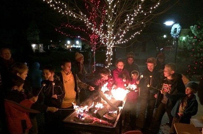 Roasting of marshmallows is one of the favorite activities during the annual stroll.
