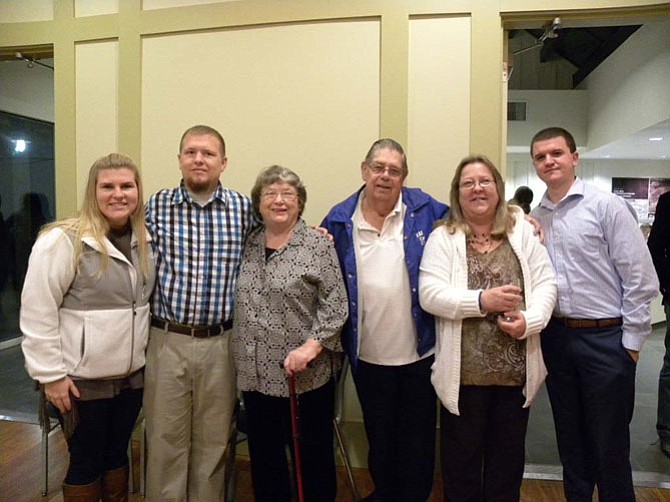 The Camper family, from left, Caitlin, Eddie III, Mary, Eddie Sr., Tanya Camper and Tim Keenan attend the Small Business Award ceremony at Historic Blenheim in Fairfax on Friday, Nov. 21.