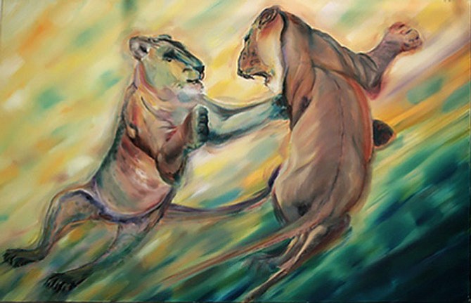 First-place winner Leesa Woodward’s "Play Time" is a study of movement and the attempt to catch that moment of self-absorbed playtime, even among adult lions. A large piece done in oils, it depicts lighthearted fun, while showing the power in the muscular feline anatomy. It will be on display in November in building W9 at the Workhouse Arts Center.
