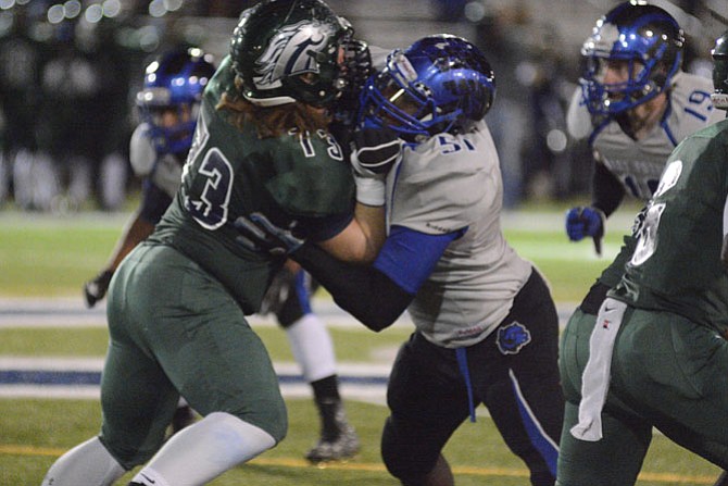 West Potomac senior lineman Ozzie Opoku, right, earned second-team All-Conference 7 honors this season.