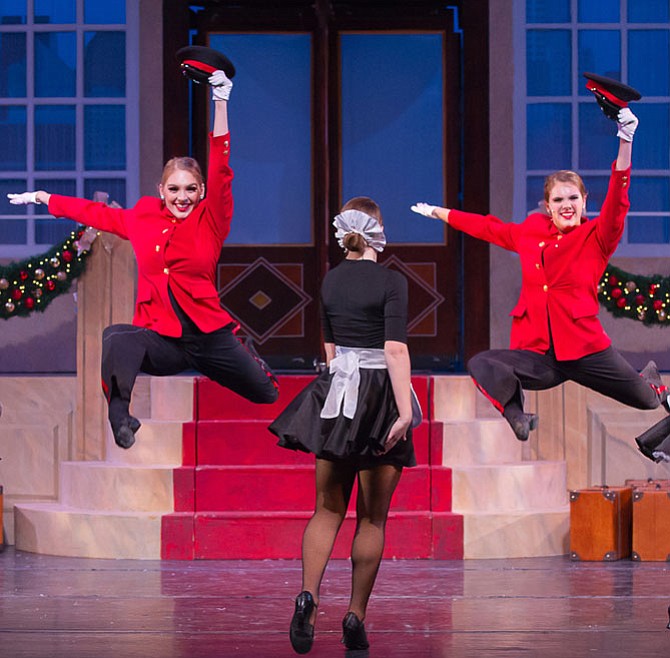 From left: Renee Griese, Sara Avery and Claire Griese kick up their heels in the number, “Welcome to the Grande.”
