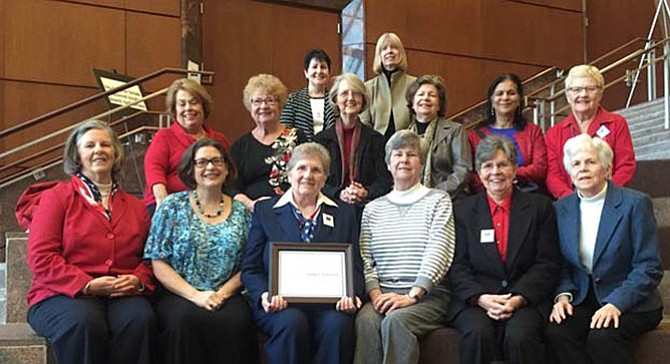 Sidney Johnson, of the League of Women Voters of the Fairfax Area, receives the Barbara Varon Award for improving community through volunteer service.

