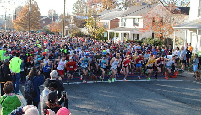 A record setting 5,700 runners lined up for the 40th anniversary of the Alexandria Turkey Trot in Del Ray. Two course records were set in the annual Thanksgiving Day race that also serves as a benefit for the ALIVE! nonprofit food bank.