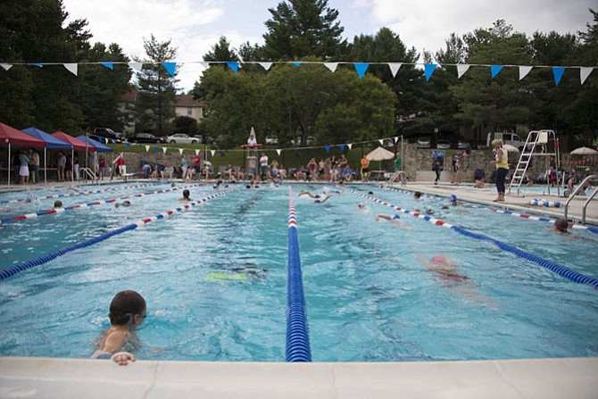 Burke swimmers participate in a Swim-A-Thon for charity during the summer season earlier in 2015.