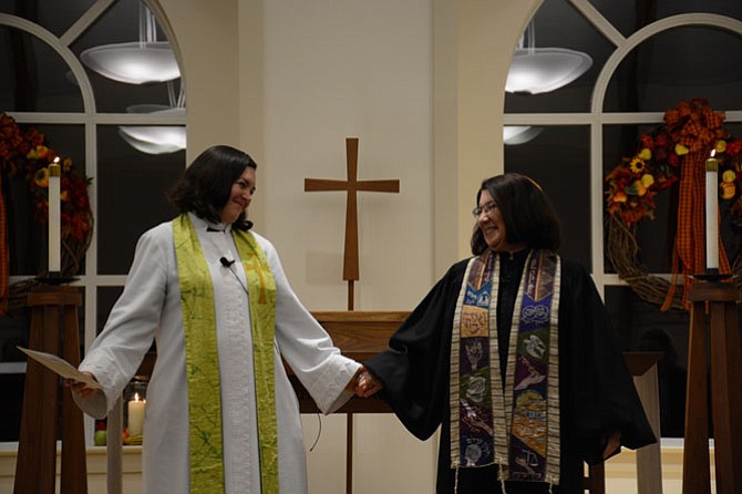 Abiding Presence Pastor Rev. Meredith Keseley (left) and Temple B’nai Shalom Rabbi Amy Perlin give a blessing at the conclusion of their joint Thanksgiving eve service.