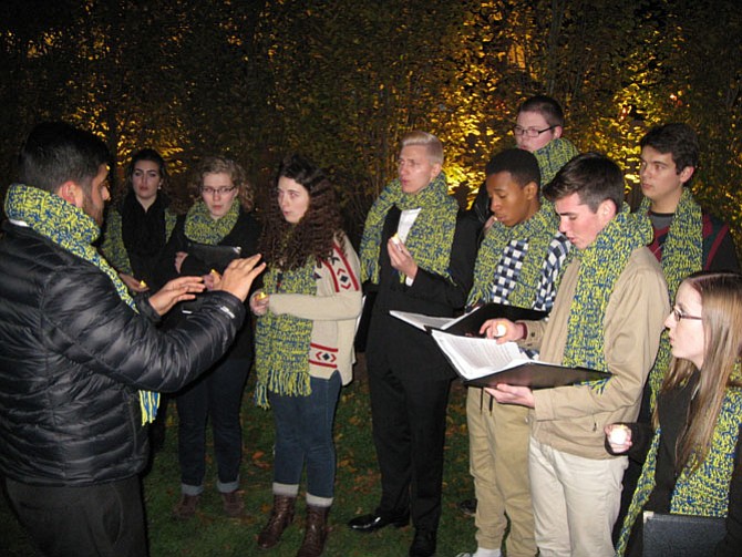 Members of the Osbourn Park Madrigal Singers sing Christmas Carols.
