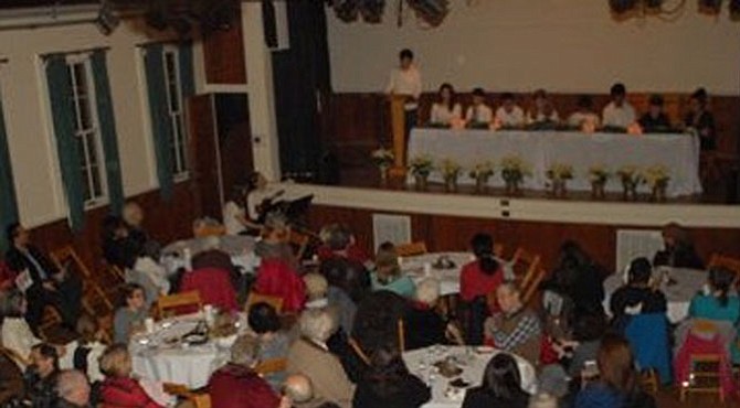 Guests listened earnestly as local youth read scriptures from their faith traditions.
