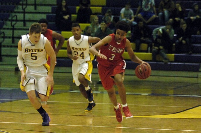 T.C. Williams junior guard Fahmmi Mamo scored a career-high 28 points against Lake Braddock on Tuesday.