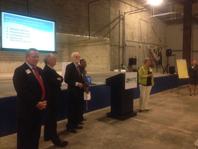 Fairfax County Chamber of Commerce CEO Jim Corcoran, new Metro general manager Paul Wiedefeld, Chair of the Board of Directors of the WMATA Mortimer L. Downey, and Fairfax County Supervisor Catherine Hudgins attended a Dec. 17 public meeting at Wiehle–Reston East station. Wiehle–Reston East station is the current final stop for the Metro’s Silver Line.
