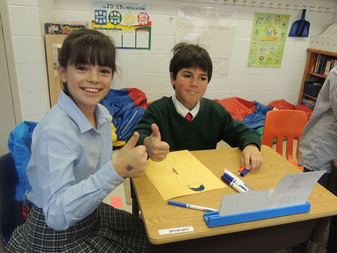 Anna Segal and her buddy George give the project to help the homeless a “Thumbs-up.”
