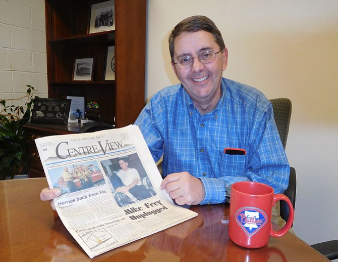 Michael Frey with his Phillies mug and a 1998 Centre View featuring a story on him.
