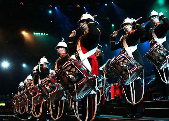 In performance: The Royal Band of the Marines, the Pipes, Drums and the Highland Dancers of the Scots Guard.
