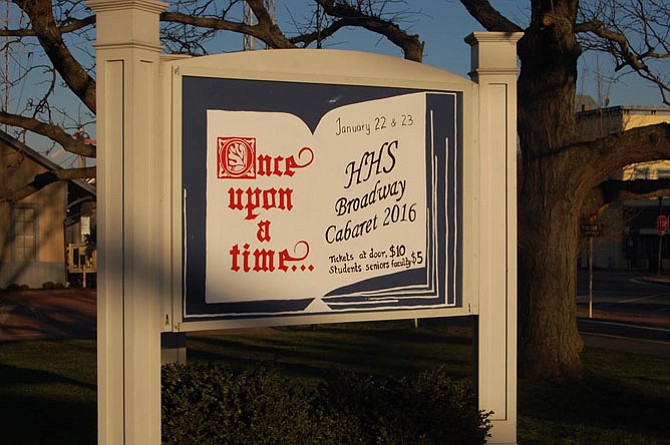 Photo of sign in downtown Herndon announcing the upcoming January Cabaret at Herndon High School. 
