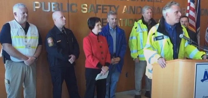 Right, Gov. Terry McAuliffe (D) speaks to the media on Sunday following Winter Storm Jonas at McConnell Public Safety and Transportation Operations Center in Fairfax.
