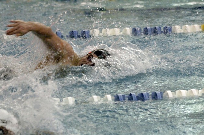 Langley senior Carter Bennett won the 50 free and 100 free during the Conference 6 championship meet on Jan. 30 at Washington-Lee High School.