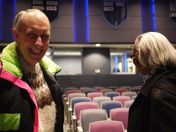 Bill Blaswell, chairman of the Neighborhood Conservation Advisory Committee,
talks with Edith Gravely after the meeting. 
