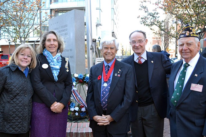 Potomac Kiwanis Club members Beth Bentolila, Jackie Cronin, Bob Cressy and Mike Cronin participate in Veterans Day ceremomies at Woodmont Triangle, Bethesda.
